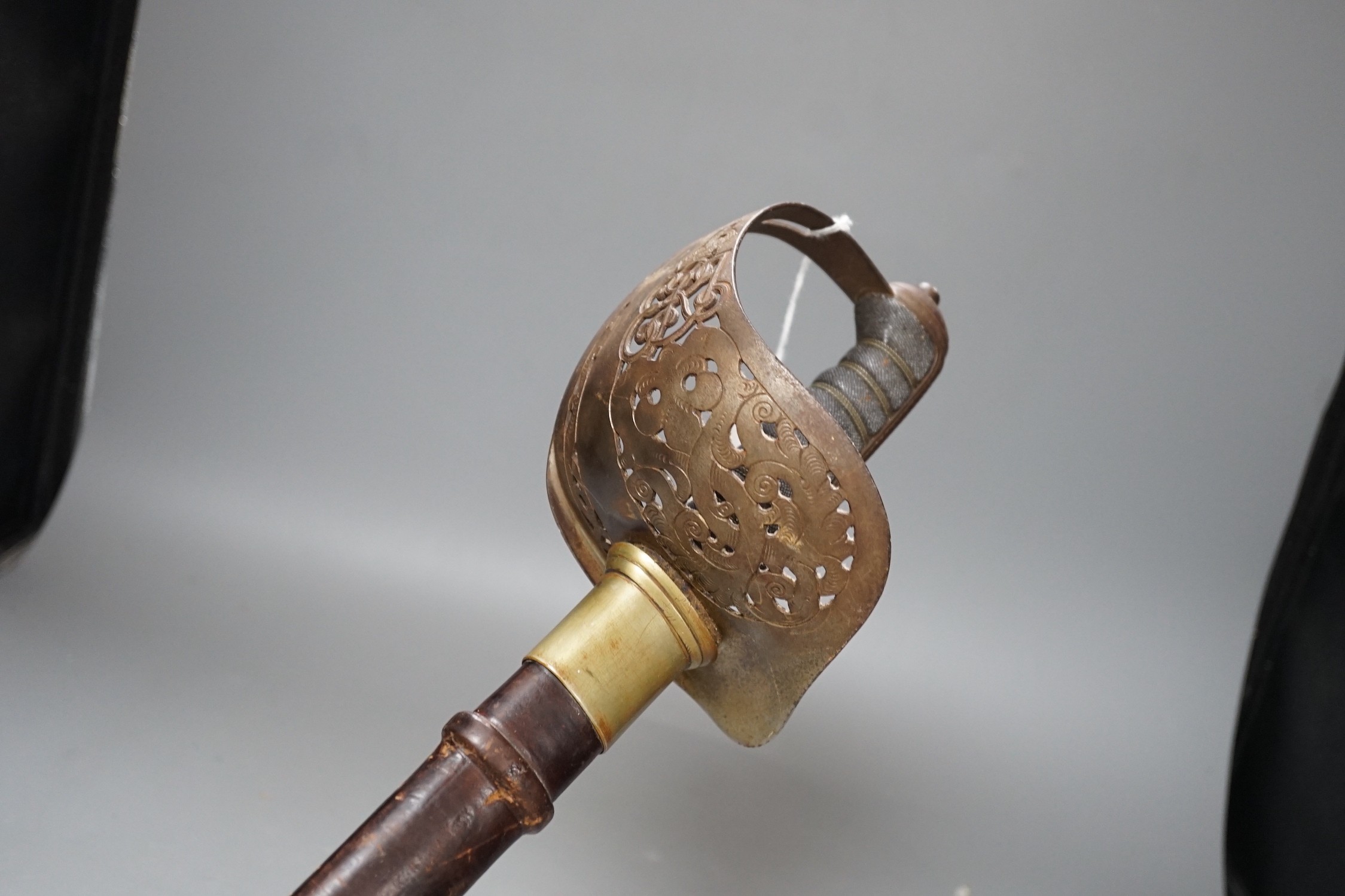 An Edward VII officer's ceremonial dress sword, the blade by Lyon & Lyon Calcutta and an Edwardian sword stick (2), sword 99cms long